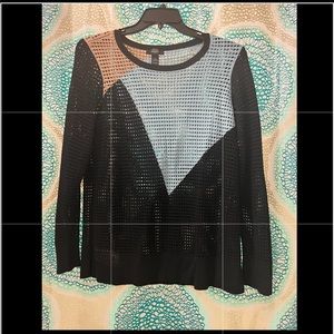 Asymmetric patterned sweater